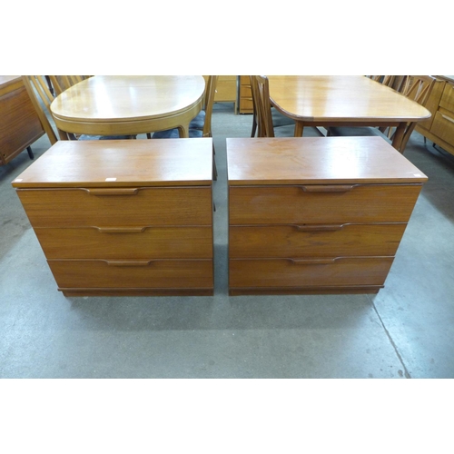 144 - A pair of teak chests of drawers