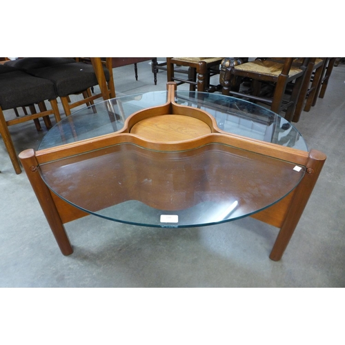 148 - A Nathan thermoformed teak and glass topped coffee table