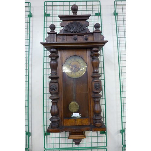 30 - A 19th Century walnut Vienna wall clock