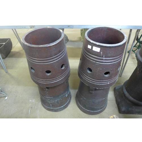 312 - A pair of glazed terracotta chimney pots