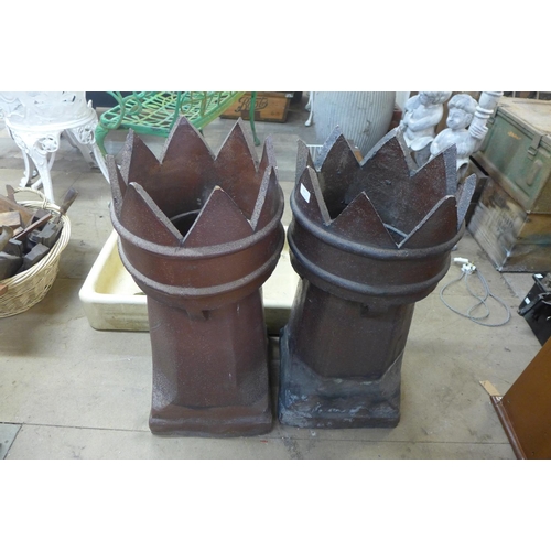 313 - A pair of glazed terracotta chimney pots