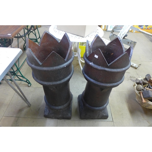 314 - A pair of glazed terracotta chimney pots