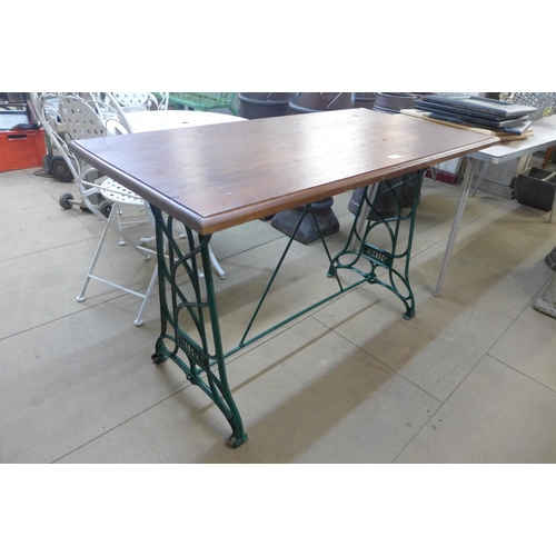 317 - A cast alloy based garden table