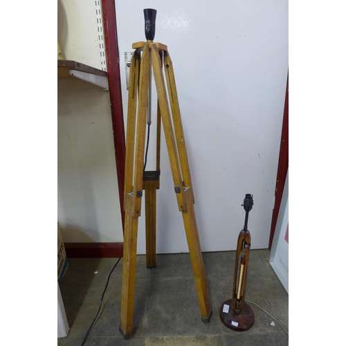 353 - A tripod floor standing lamp and a table lamp