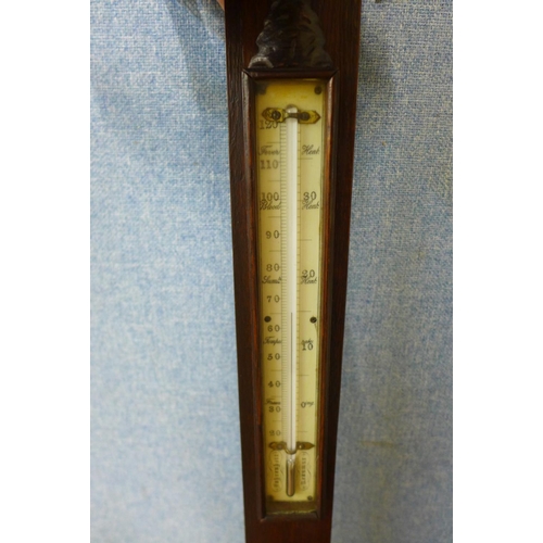 53 - A Victorian carved oak stick barometer, the ivory coloured dial signed J. Brunner, Edgbaston Street,... 