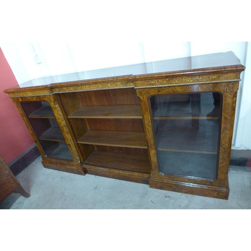 95 - A Victorian inlaid walnut and ormolu mounted breakfront bookcase