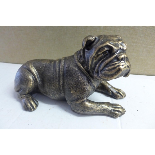 2101 - Lying bulldog figure - this lot is subject to VAT