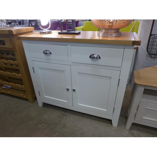 1533 - A Chester oak and white two door sideboard.  -  *this lot is subject to vat