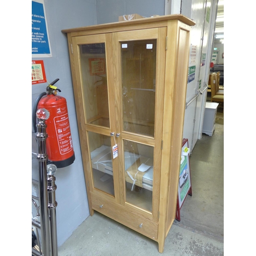 1855 - A Bergen oak display cabinet (NT-DIS) * This lot is subject to VAT. Damaged leg