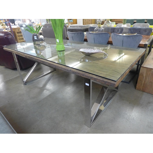 1422 - A large wooden Chennai table with a glass top