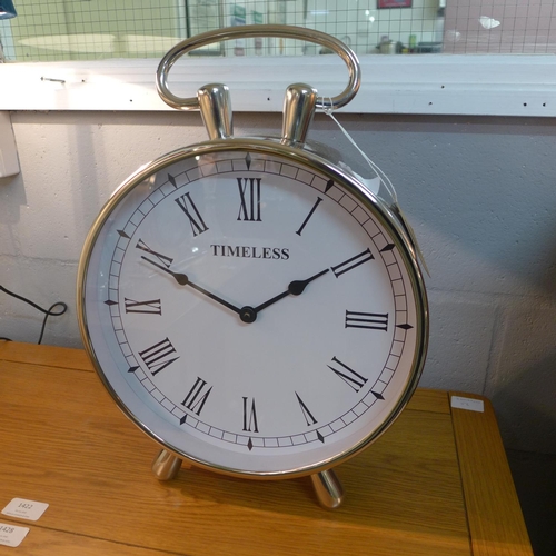 1429 - A circular chrome table clock with loop handle (1754225)   #