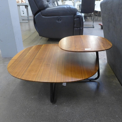 1565 - A walnut two top black base coffee table