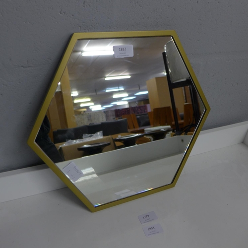 1832 - A hexagonal brass effect mirror