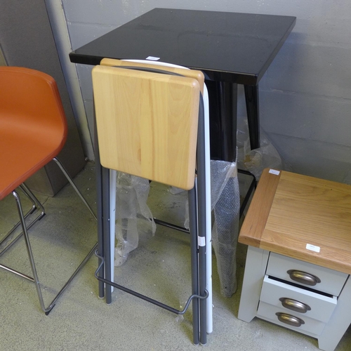 1846 - A black painted square bar table and two bar stools