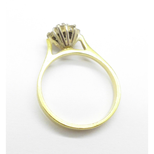 1299 - An 18ct gold cluster ring, 2.8g, L