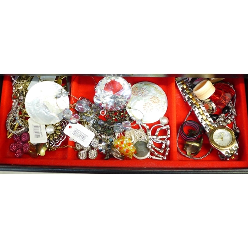 664 - A jewellery box containing fashion and costume jewellery