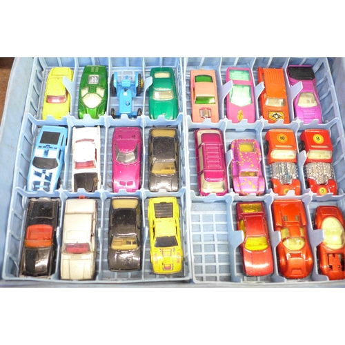 667 - A Matchbox carrying case with die-cast vehicles