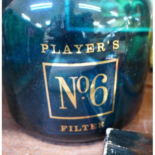 671 - John Player decanters, catalogue and lighters, etc.