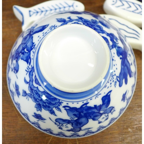 679 - Chinese blue and white tea plates, rice bowls, napkin rings, rice spoons and fish shaped chopstick r... 