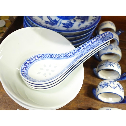 679 - Chinese blue and white tea plates, rice bowls, napkin rings, rice spoons and fish shaped chopstick r... 