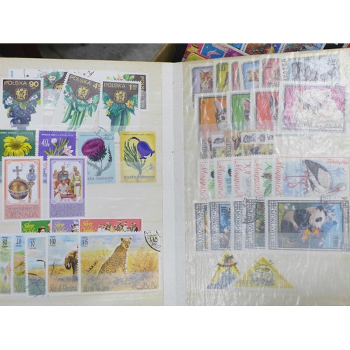 724 - Stamps; a box of stamps, covers, catalogues, etc.