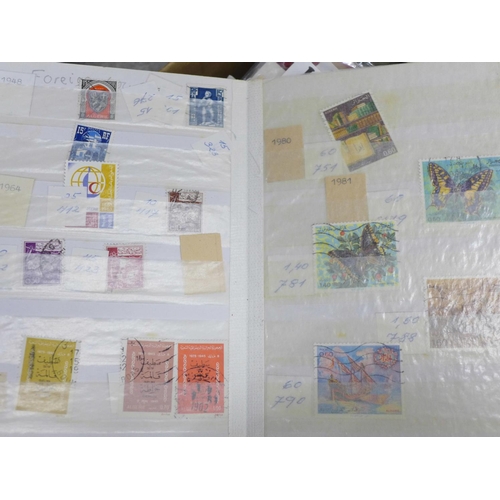 724 - Stamps; a box of stamps, covers, catalogues, etc.