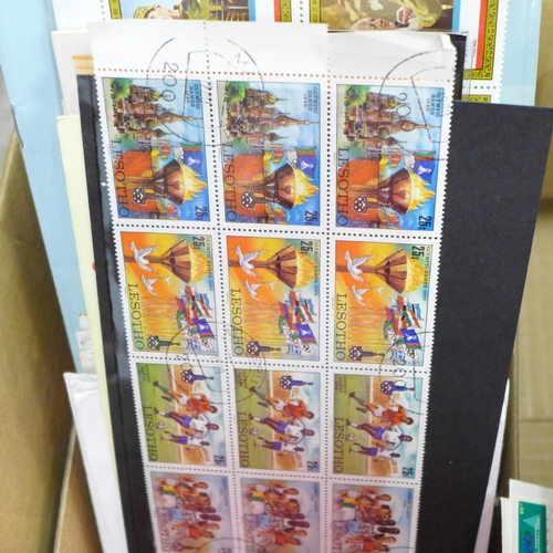 724 - Stamps; a box of stamps, covers, catalogues, etc.