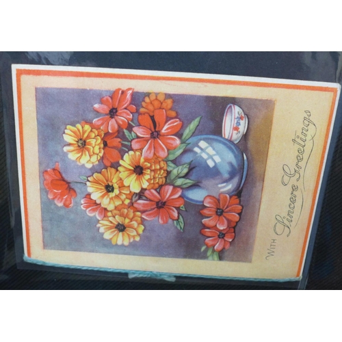 741 - Paper ephemera; a box of comics, photograph albums, greetings cards, etc., mainly 1900-1940