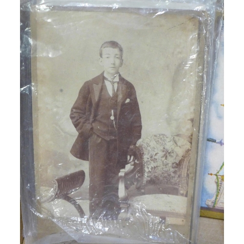 741 - Paper ephemera; a box of comics, photograph albums, greetings cards, etc., mainly 1900-1940