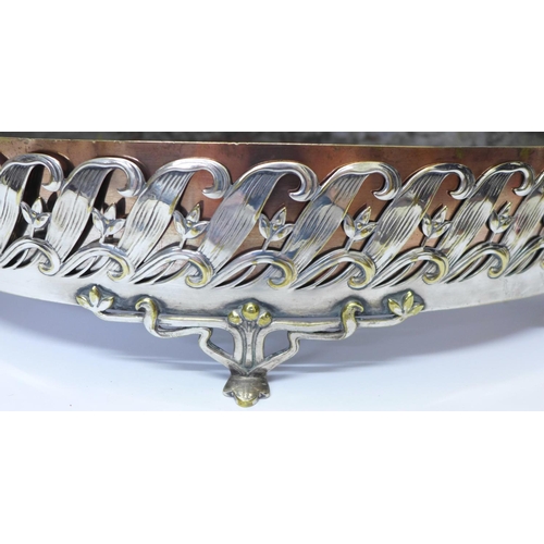 778 - An Art Nouveau silver plated dish with liner