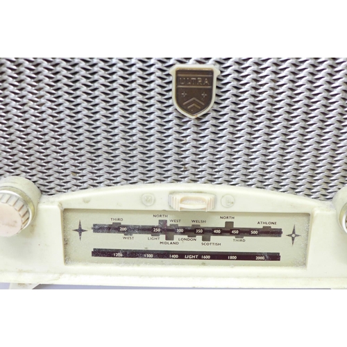 781 - An Ultra ivory Bakelite radio with receipt dated 1954