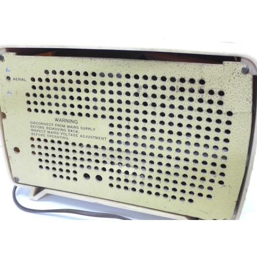 781 - An Ultra ivory Bakelite radio with receipt dated 1954