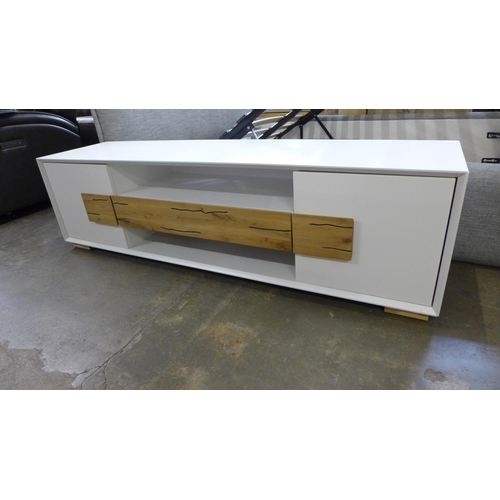 1508 - A two door, one drawer white Orion TV unit - boxed