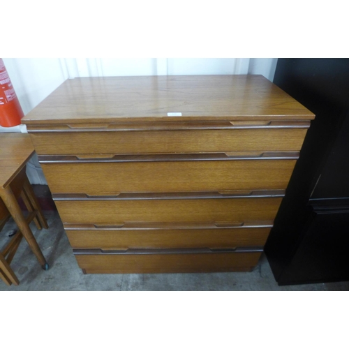 112 - A teak chest of drawers