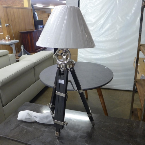 1736 - An industrial style tripod lamp