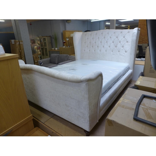 1593 - A cream upholstered kingsize bed frame