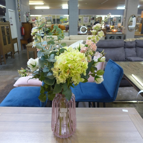 1604 - A pink glass vase with hand tied bouquet of summer blooms