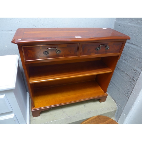 1875 - A two drawer small bookcase with serpentine front