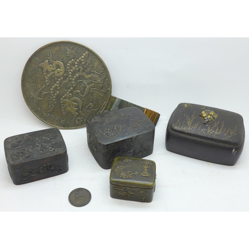638 - A Japanese Komai style iron trinket box overlaid with gold decoration and three other oriental boxes... 