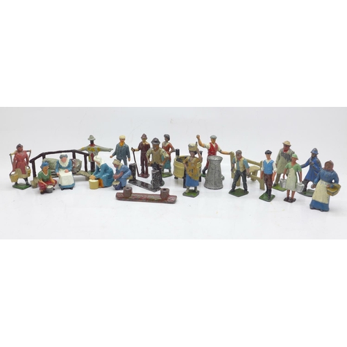 641 - A collection of painted lead farmyard figures including Britains and John Hill