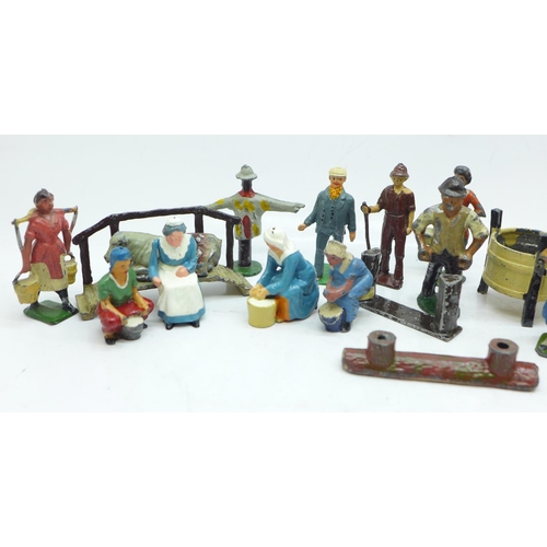 641 - A collection of painted lead farmyard figures including Britains and John Hill