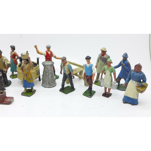 641 - A collection of painted lead farmyard figures including Britains and John Hill