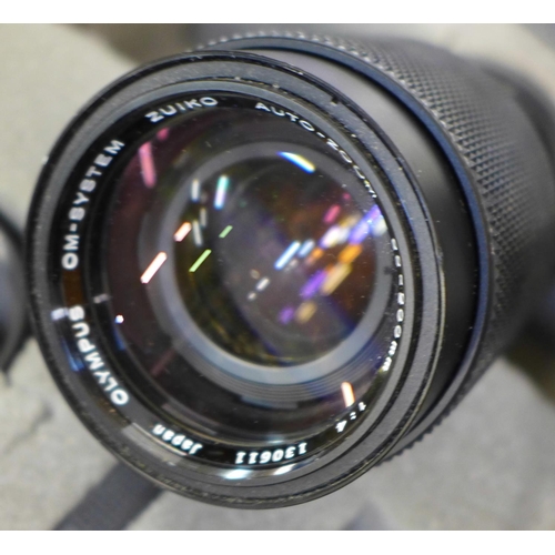 784 - Olympus OM40 35mm film cameras x2, four lenses, (Sigma mini-wide II 1:2.8, Olympus Auto-S 50mm 1:1.8... 