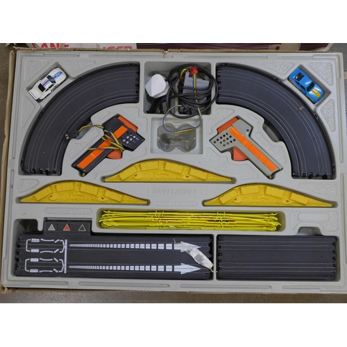 801 - A SRM Scale Raceway Models Grand Prix electric slot car racing game and a Matchbox Lane Changer game... 