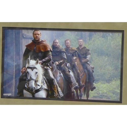 807 - A signed Russell Crowe photograph and other photographs from Robin Hood, mounted and framed with cer... 