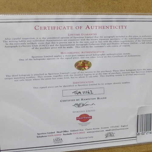 823 - A signed Charles Bronson mounted and framed photograph with a certificate of authenticity on reverse... 
