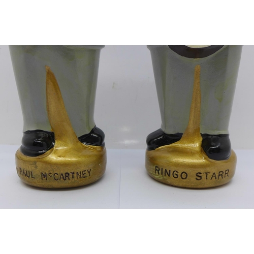 827 - The Beatles pot figures, Paul McCartney and Ringo Starr, stamped NEMS 1965 to the base, Paul McCartn... 