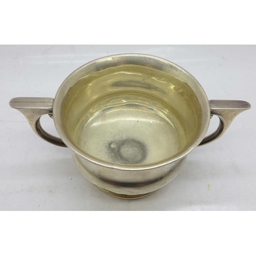 849 - A silver porringer with small dent, 90.4g