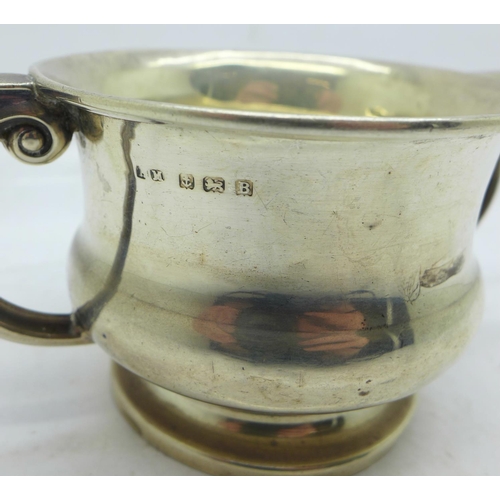 849 - A silver porringer with small dent, 90.4g