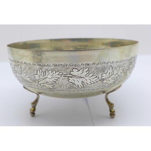 857 - A white metal bowl, marked 830, a shot and a small model boat